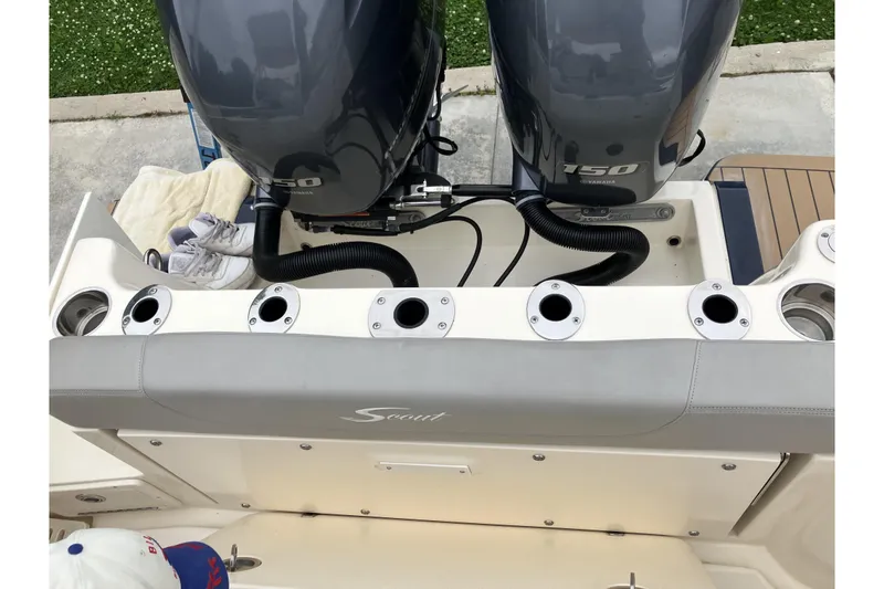 Slide: The Image of 2021 Scout 255 Dorado boat with dual Yamaha 150 engines, rear view. - 9