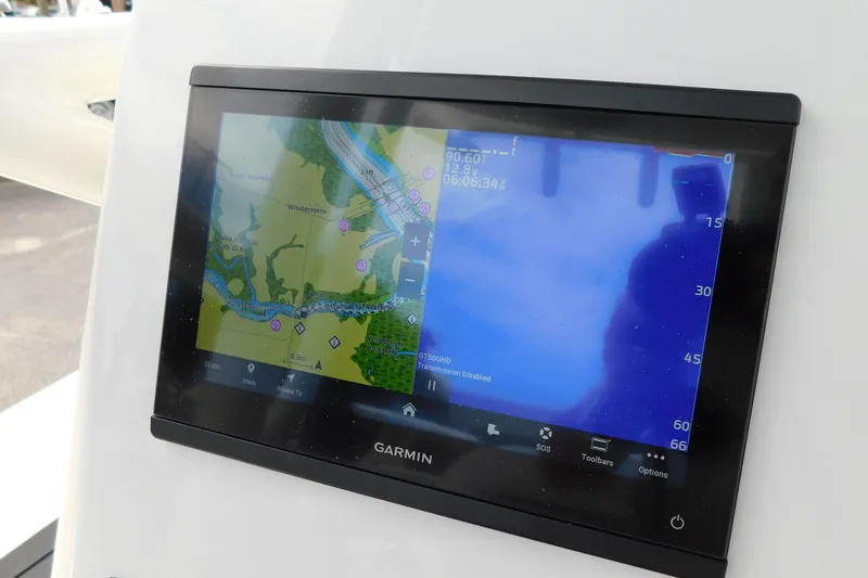 Slide: The Image of Garmin navigation display on 2026 Pathfinder 2200 TRS boat, showing map and sonar. - 20