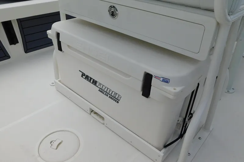 Slide: The Image of 2026 Pathfinder 2200 TRS boat with cooler, featuring "Angler Driven" branding. - 29
