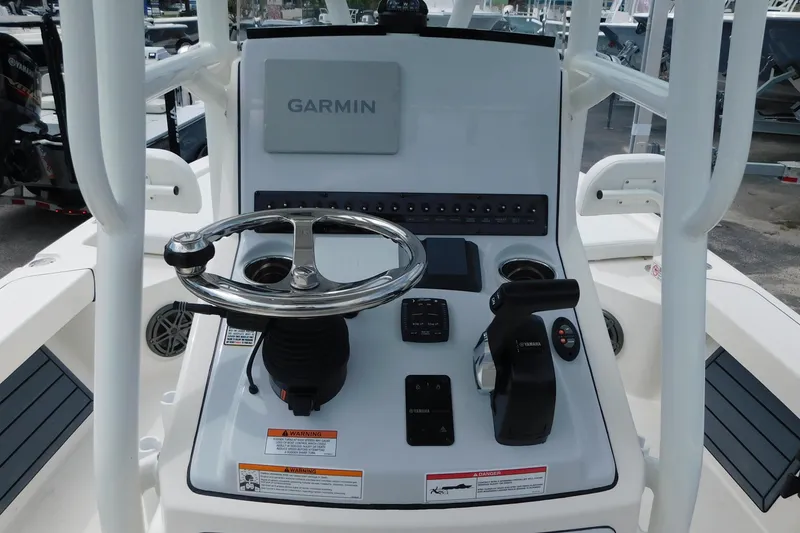 Slide: The Image of 2026 Pathfinder 2200 TRS boat console with Garmin navigation and Yamaha controls. - 3
