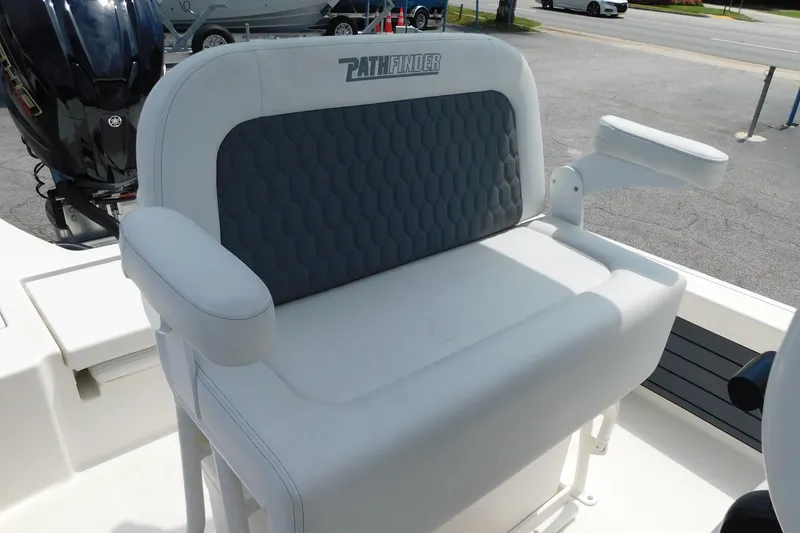 Slide: The Image of 2026 Pathfinder 2200 TRS boat seat with armrests and textured backrest. - 5