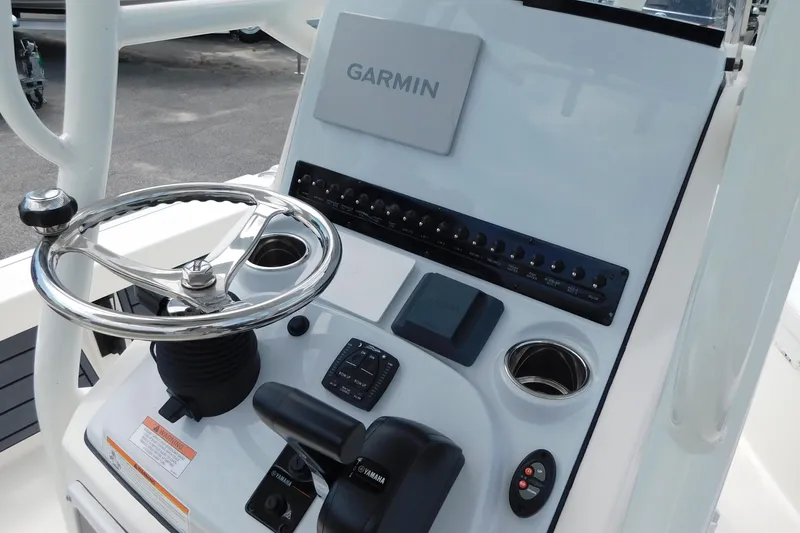 Slide: The Image of 2026 Pathfinder 2200 TRS boat console with Garmin navigation and Yamaha controls. - 6