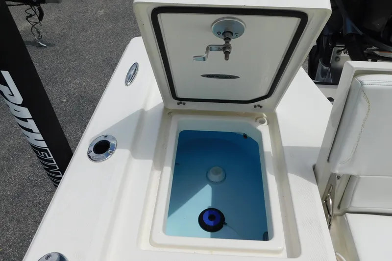 Slide: The Image of Open livewell on 2026 Pathfinder 2200 TRS boat, showcasing interior features. - 9