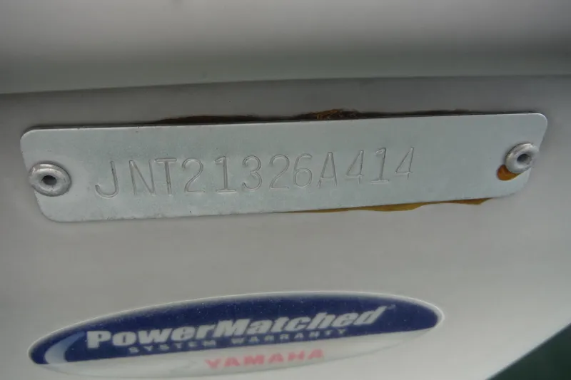 Slide: The Image of 2014 NauticStar 210 Angler boat identification plate with PowerMatched Yamaha warranty sticker. - 26