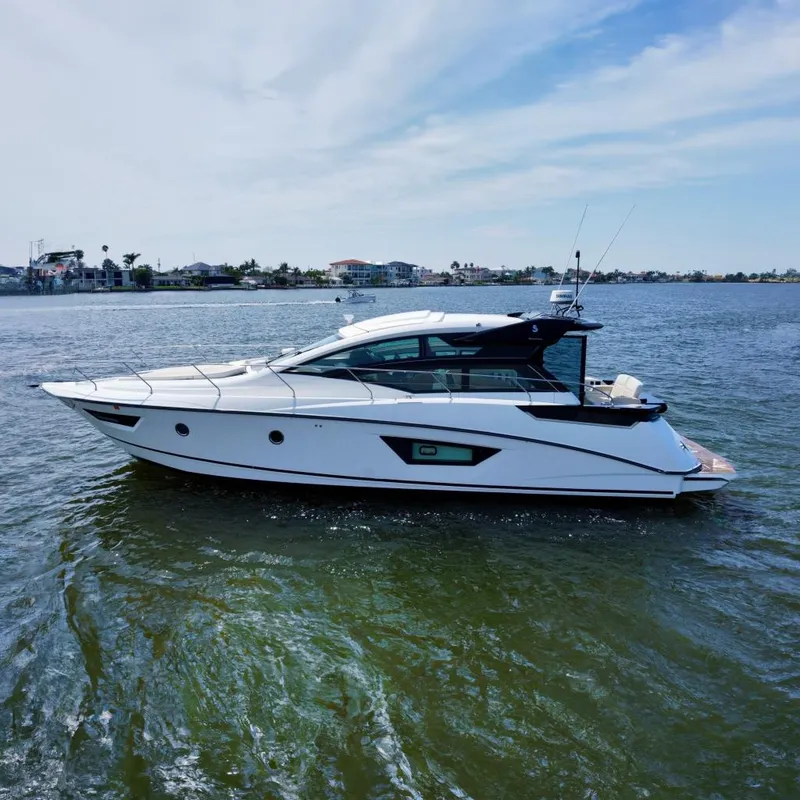 The Image of 2018 Beneteau Gran Turismo 46 yacht on calm water, showcasing sleek design and modern features. - 0