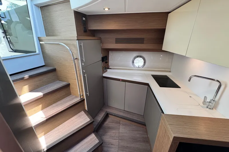 Slide: The Image of Interior of 2018 Beneteau Gran Turismo 46 yacht, featuring modern kitchen design. - 28