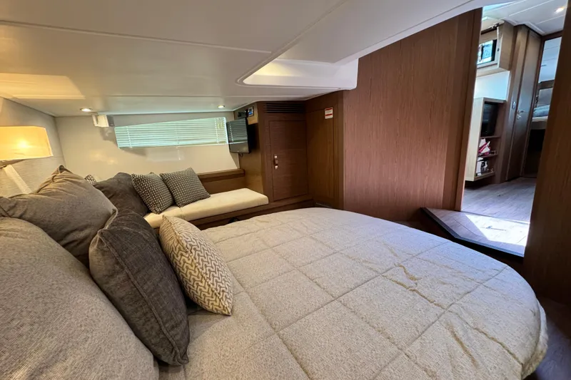 Slide: The Image of Luxurious interior of 2018 Beneteau Gran Turismo 46 yacht with cozy bedding and modern decor. - 35