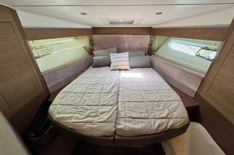 Slide: The Image of Luxurious cabin interior of 2018 Beneteau Gran Turismo 46 yacht with cozy bedding. - 39