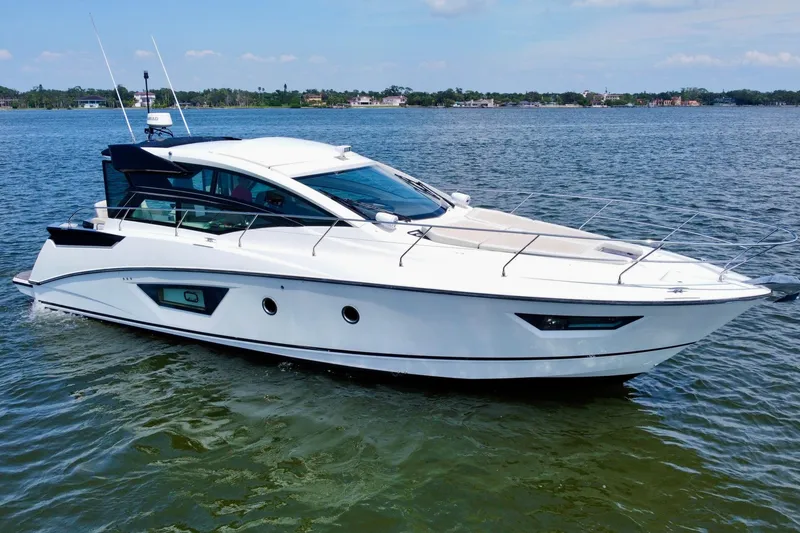 Slide: The Image of 2018 Beneteau Gran Turismo 46 yacht cruising on calm waters. - 4