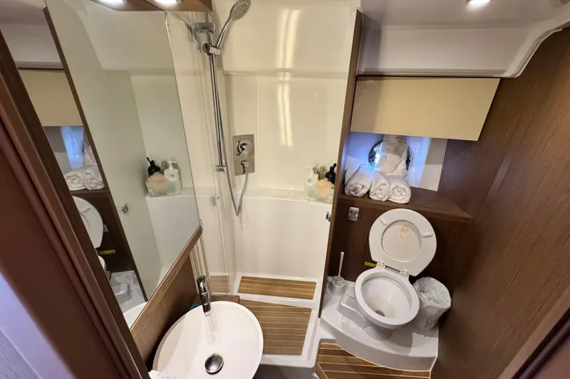 Slide: The Image of Luxurious bathroom in 2018 Beneteau Gran Turismo 46 yacht with shower and toilet. - 41