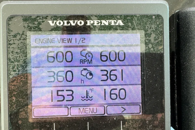 Slide: The Image of Volvo Penta engine display on 2018 Beneteau Gran Turismo 46, showing RPM and temperature. - 49