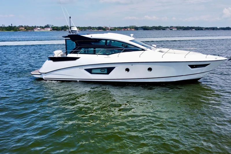 Slide: The Image of 2018 Beneteau Gran Turismo 46 yacht cruising on calm waters. - 5