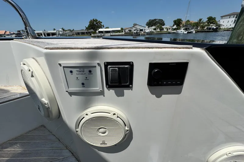 Slide: The Image of Control panel and speakers on a 2018 Beneteau Gran Turismo 46 yacht deck. - 51