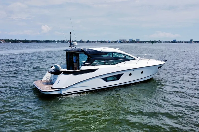 Slide: The Image of 2018 Beneteau Gran Turismo 46 yacht cruising on open water. - 6