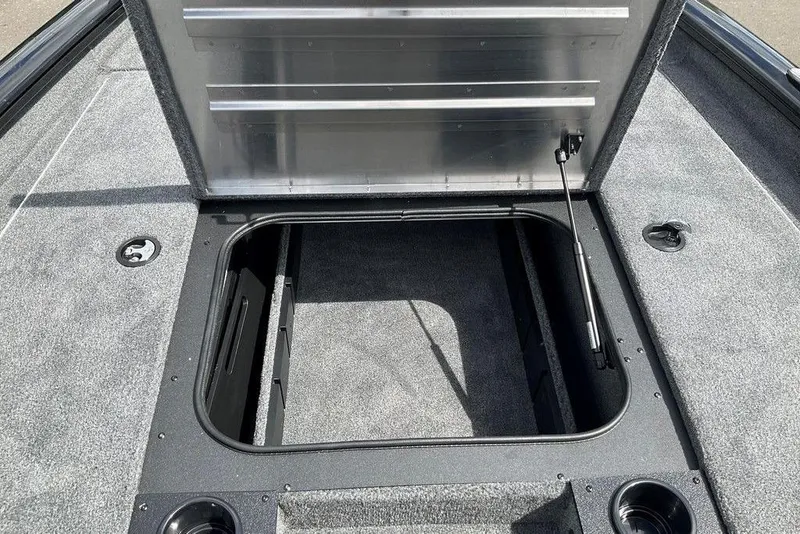 Slide: The Image of Open storage compartment on 2025 Tracker Pro Team 175 boat deck. - 23