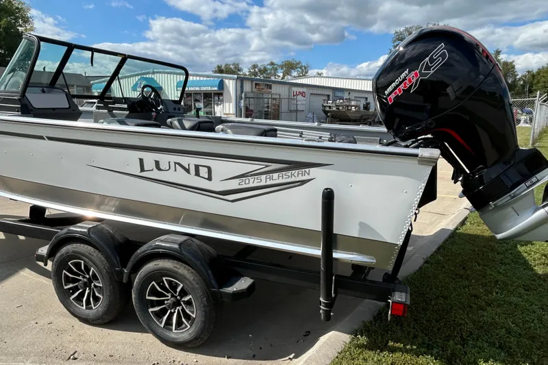 Slide: The Image of 2026 Lund 2075 Alaskan Sport boat with Mercury Pro XS engine on trailer. - 10