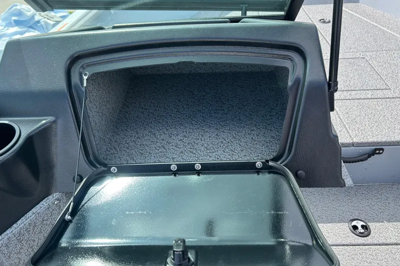 Slide: The Image of Open storage compartment in 2026 Lund 2075 Alaskan Sport boat. - 19