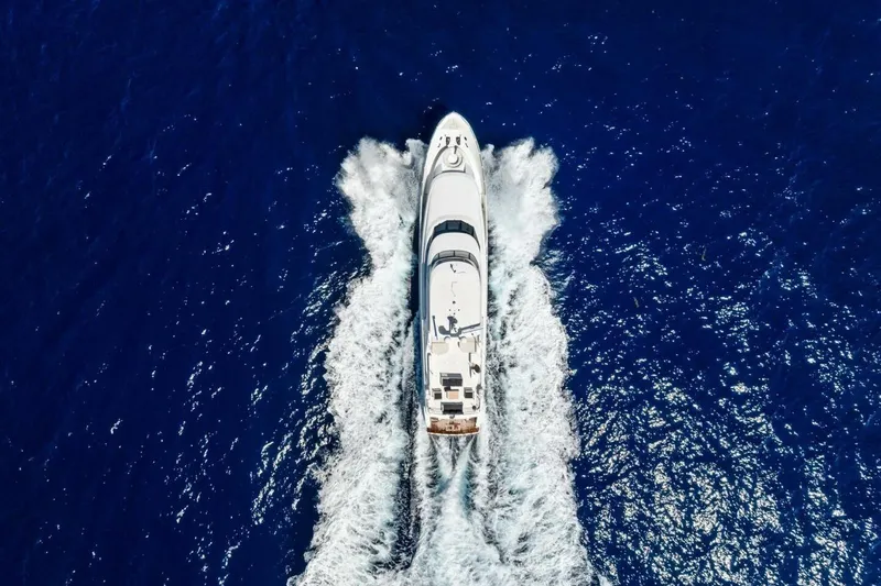 Slide: The Image of Aerial view of 2011 Westport yacht cruising through deep blue ocean waters. - 10