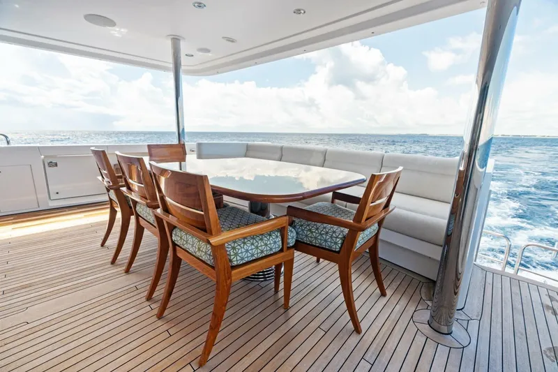 Slide: The Image of Luxurious 2011 Westport yacht deck with elegant dining area overlooking the ocean. - 18