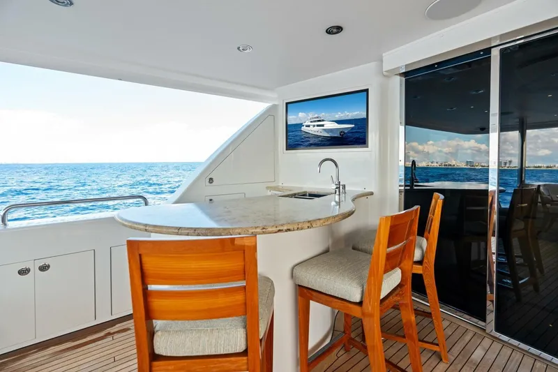 Slide: The Image of Luxurious 2011 Westport yacht interior with bar, ocean view, and modern amenities. - 19