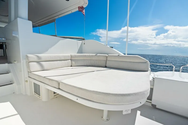 Slide: The Image of Luxurious seating area on 2011 Westport yacht with ocean view and clear blue sky. - 25
