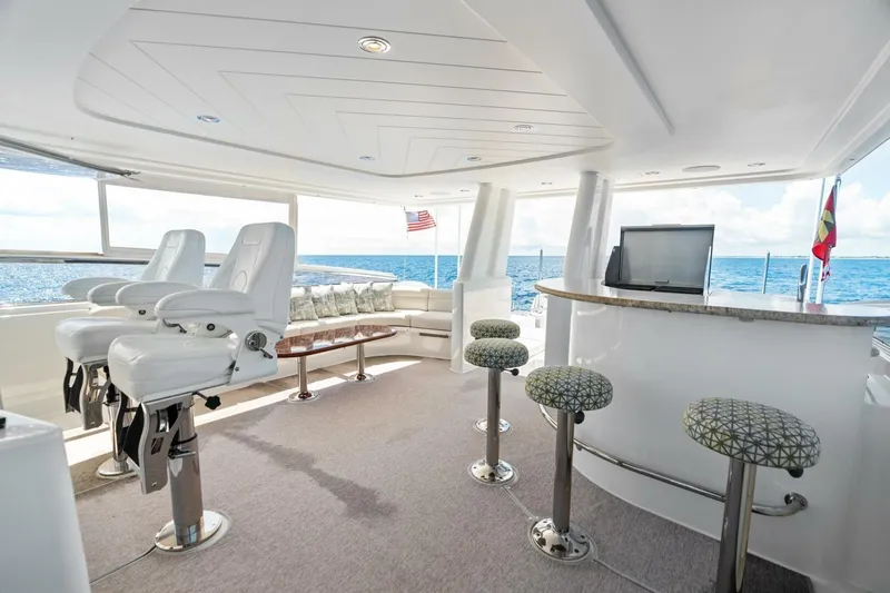 Slide: The Image of Luxurious 2011 Westport yacht interior with bar, seating, and ocean view. - 30