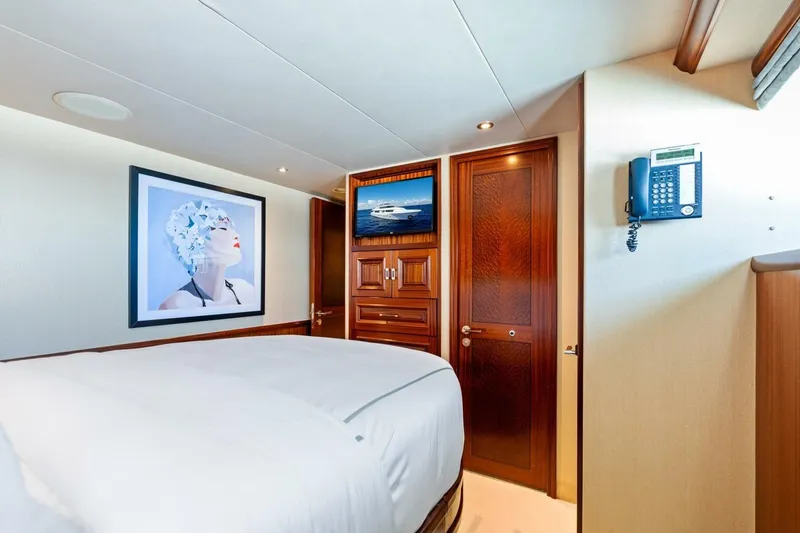 Slide: The Image of Luxurious 2011 Westport yacht bedroom with elegant wood finishes and modern artwork. - 58