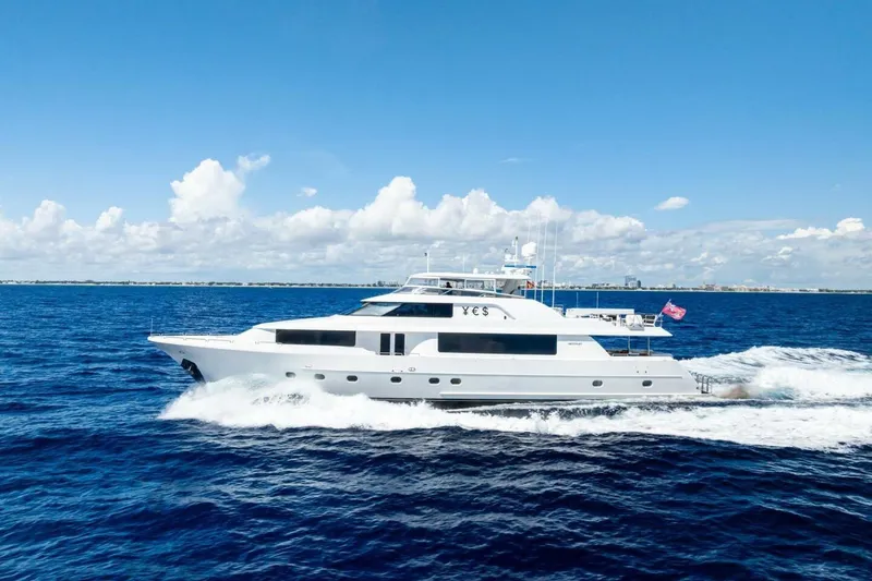Slide: The Image of Luxurious 2011 Westport yacht cruising on open sea under clear blue sky. - 6