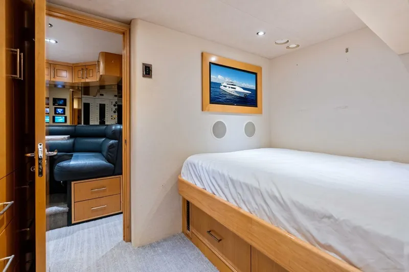 Slide: The Image of Luxurious 2011 Westport yacht interior with cozy bedroom and modern lounge area. - 73