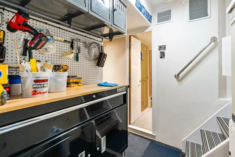 Slide: The Image of Workshop area on a 2011 Westport yacht with tools and storage. - 79