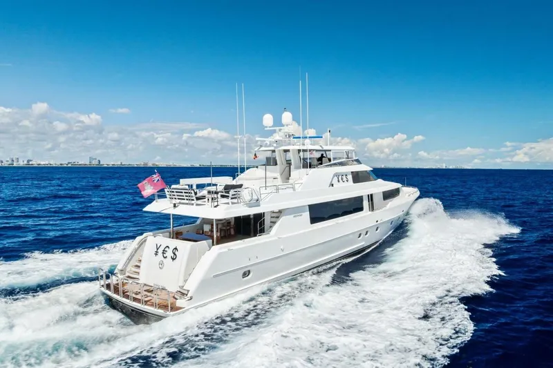 Slide: The Image of Luxurious 2011 Westport yacht cruising on open sea under clear blue sky. - 8