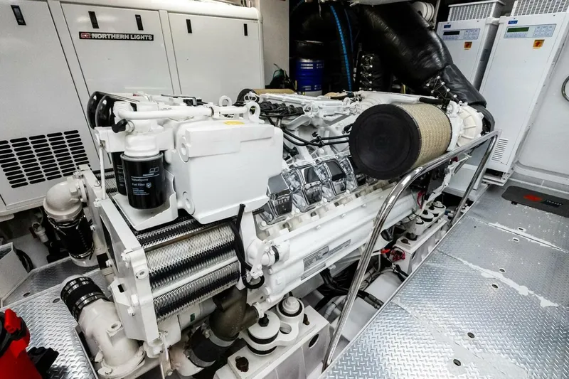 Slide: The Image of Engine room of a 2011 Westport yacht featuring a Northern Lights generator. - 87