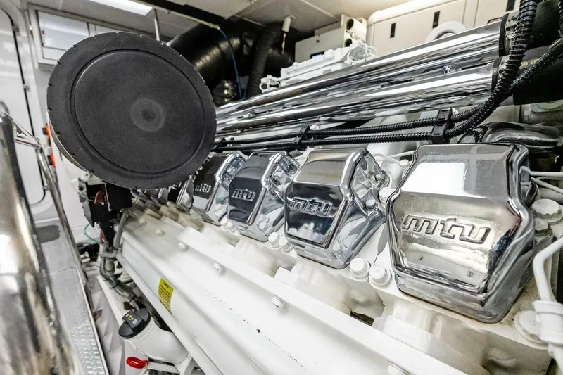 Slide: The Image of Close-up of a 2011 Westport engine with shiny MTU components. - 90