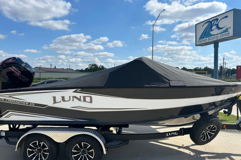 Slide: The Image of 2026 Lund 1875 Crossover XS boat with cover at Premier Boating Center. - 5