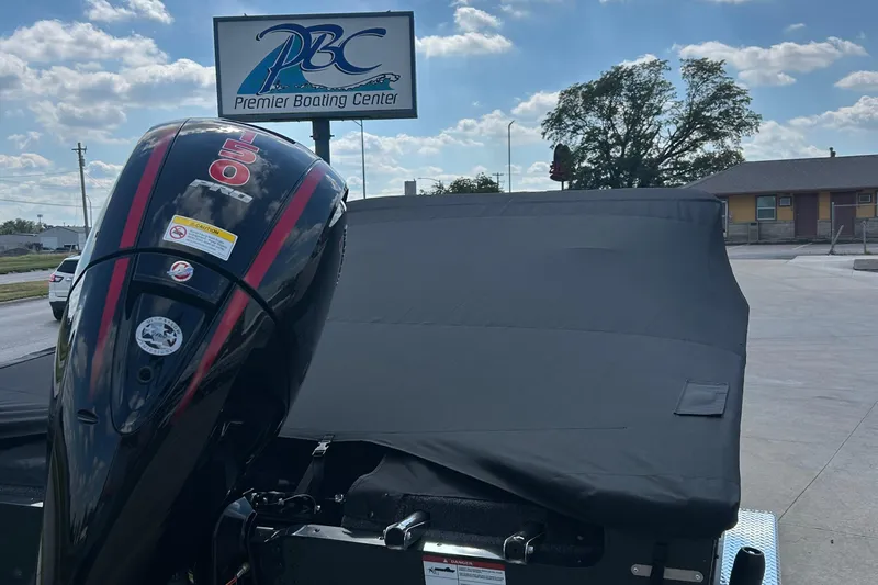 Slide: The Image of 2026 Lund 1875 Crossover XS boat with Mercury 50 engine at Premier Boating Center. - 9