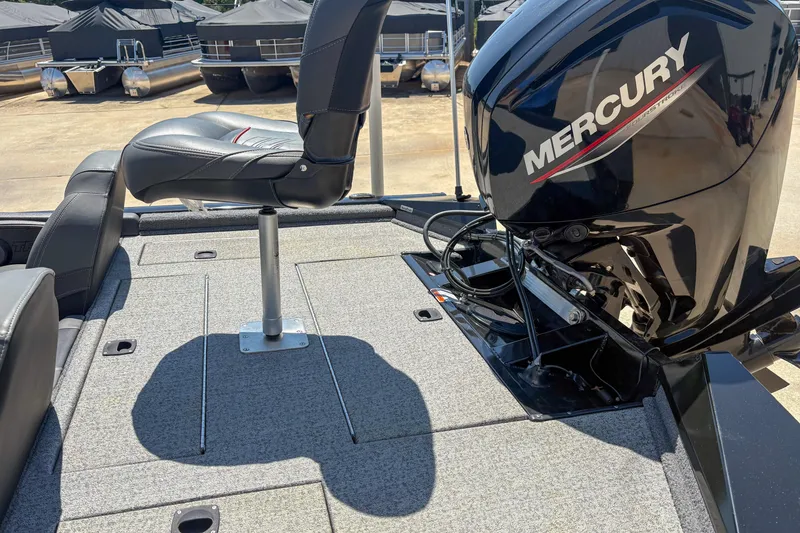 Slide: The Image of 2021 Tracker Pro Team 175 TXW boat with Mercury engine and seating. - 9