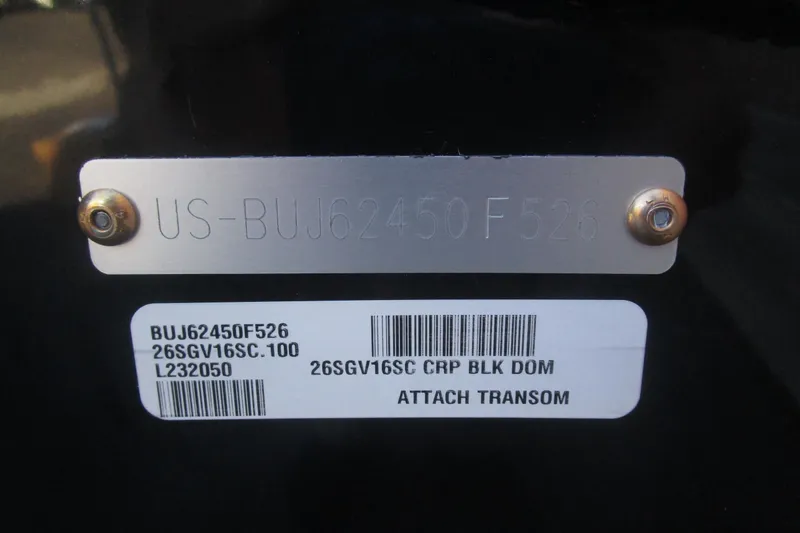 Slide: The Image of 2026 Tracker Super Guide V-16 serial number plate with barcode and transom attachment. - 13