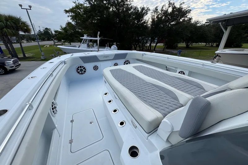 Slide: The Image of 2026 Invincible 40 Catamaran with spacious deck and luxurious seating. - 21