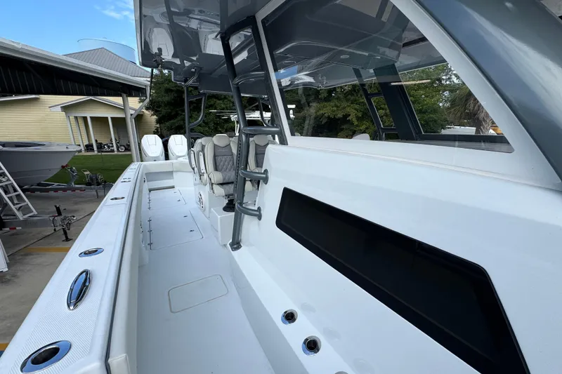 Slide: The Image of 2026 Invincible 40 Catamaran with sleek design and spacious deck layout. - 25