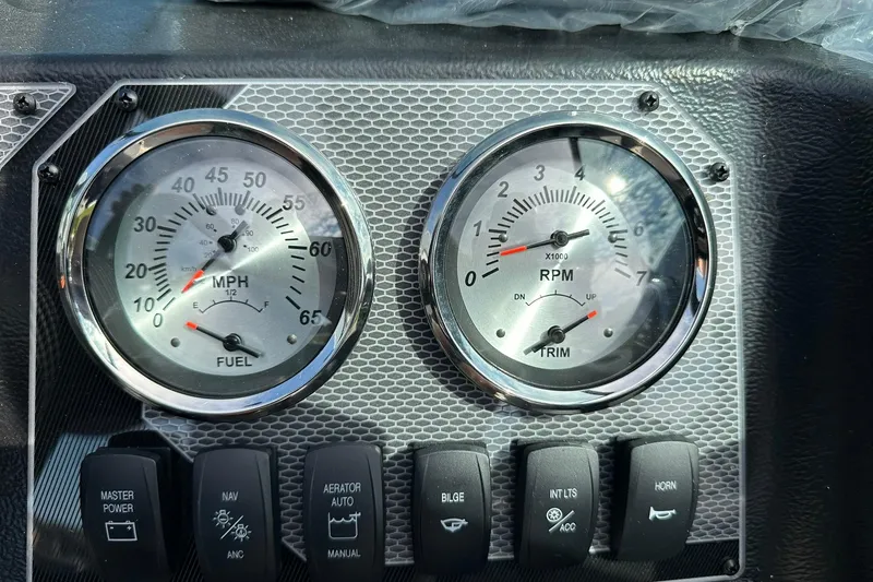 Slide: The Image of Dashboard of 2026 Lund 1650 Rebel XL Sport with speedometer and RPM gauges. - 19