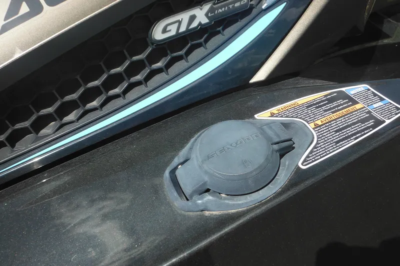 Slide: The Image of 2016 Sea-Doo GTX Limited 300 fuel cap and warning label close-up. - 14