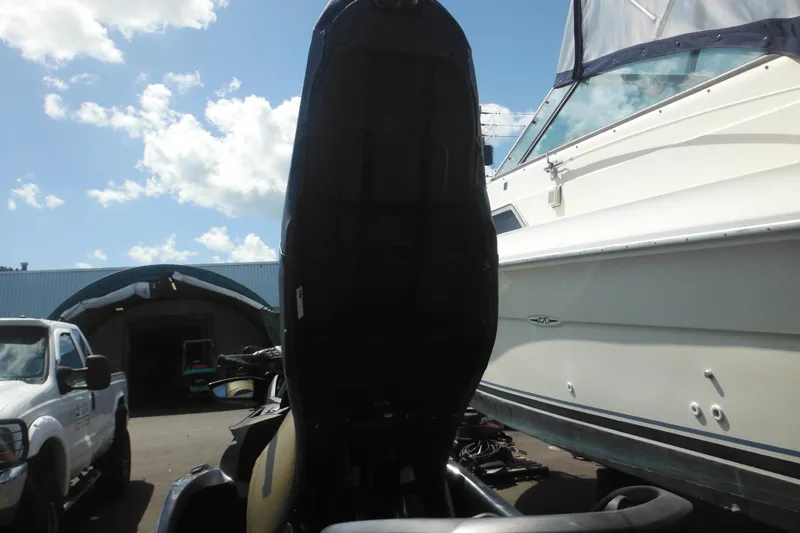 Slide: The Image of 2016 Sea-Doo GTX Limited 300 jet ski parked beside a boat and truck. - 20