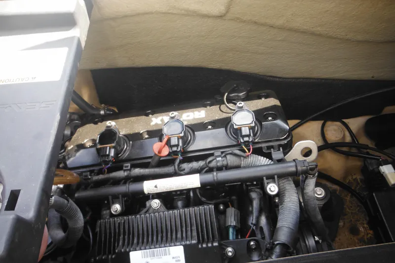 Slide: The Image of 2016 Sea-Doo GTX Limited 300 engine compartment, showcasing internal components and wiring. - 24