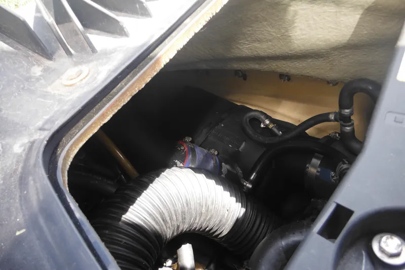 Slide: The Image of 2016 Sea-Doo GTX Limited 300 engine compartment with visible hoses and components. - 25