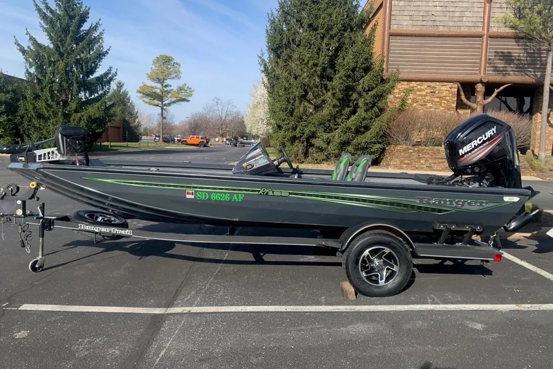 The Image of 2023 Ranger RT188 boat with Mercury engine, parked outdoors on a trailer. - 0
