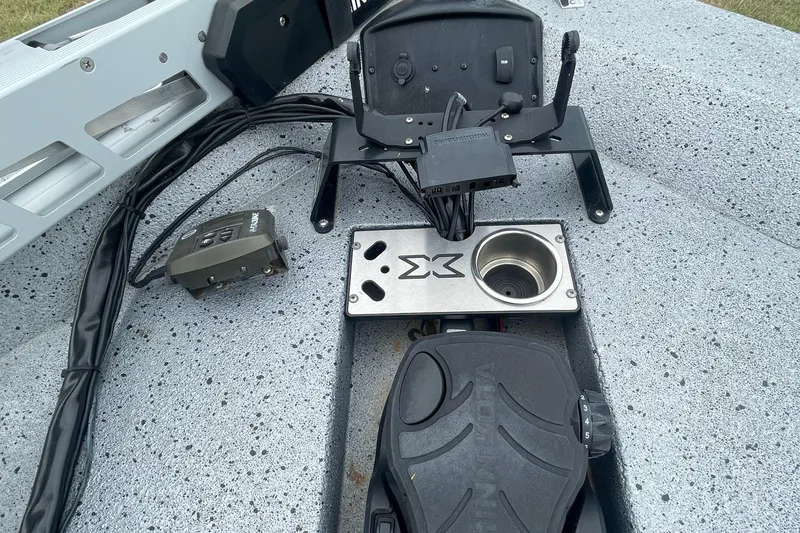 Slide: The Image of 2017 Xpress X21 boat deck with control panel and foot pedal. - 7