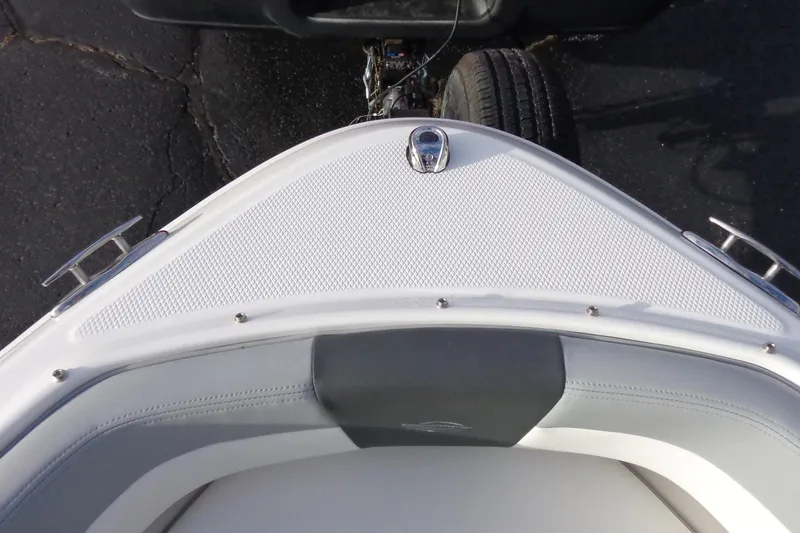 Slide: The Image of 2024 Chaparral 19 SSi OB boat bow with textured deck and cleats. - 12