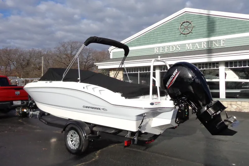 Slide: The Image of 2024 Chaparral 19 SSi OB boat with Mercury outboard at Reed's Marine dealership. - 23
