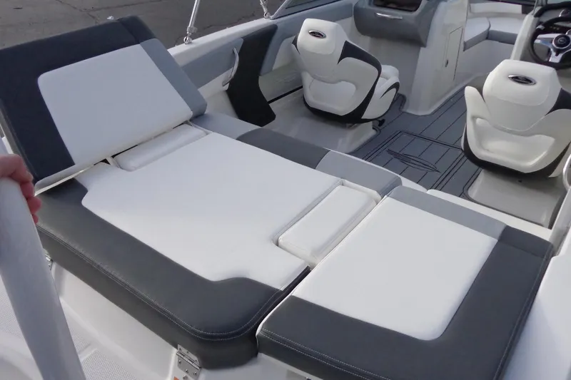 Slide: The Image of 2024 Chaparral 19 SSi OB boat interior with white and gray seating layout. - 4