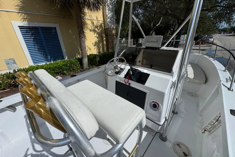 Slide: The Image of 1988 Pursuit C 200 Center Console boat interior with Garmin navigation system. - 8